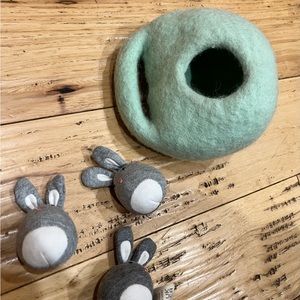 Lovevery hiding bunnies in a burrow